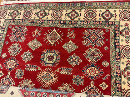 Afghan Kazak Rug, 8'2" x 10'8", in green, ivory and red