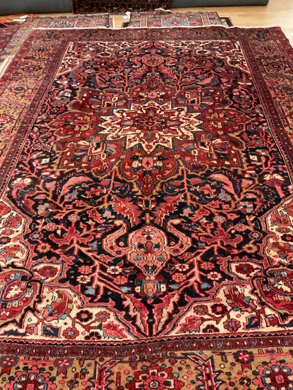 Vintage Persian Heriz Rug, 9'5" x 12'8", in brick, ivory, navy and yellow