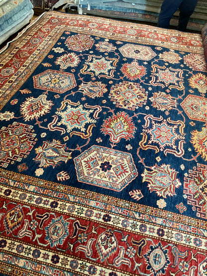 Afghan Kazak Rug, 8'10" x 11'10", in blue, ivory and red