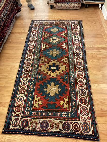Antique Russian Kazak Runner, 3'9" x 7'7", in gold, ivory, navy and red