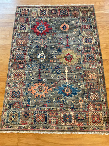 Afghan Mohal Rug, 4' x 5'8", in gold, grey, navy and orange