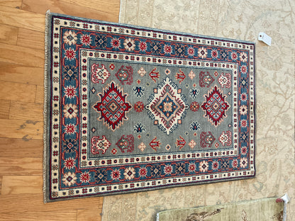 Pakistani Kazak Rug, 2'8" x 3'10", in blue, grey, ivory and red - photo 2