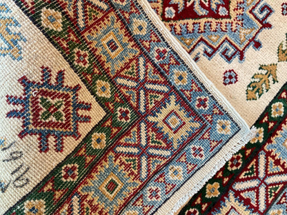 Pakistani Kazak Rug, 2'7" x 4'3", in blue, burgundy, hunter green and ivory - photo 4