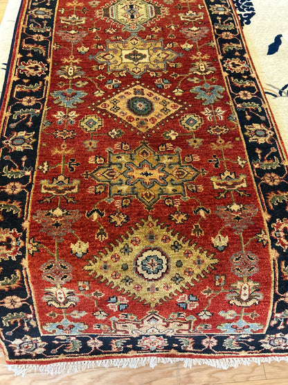 Indian Karajh Runner, 2'7" x 15'10", in gold, green, navy and red
