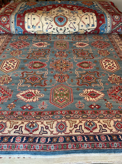 Pakistani Kazak Rug, 9'10" x 13'10", in blue, ivory, navy and red