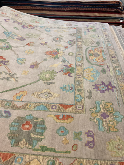 Indian Oushak Rug, 8'11" x 11'9", in green, grey, purple and rust