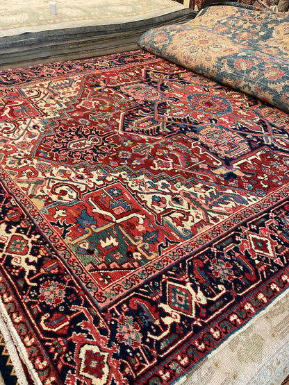 Antique Persian Heriz Rug, 8'5" x 11'8", in brick, ivory, navy and rust