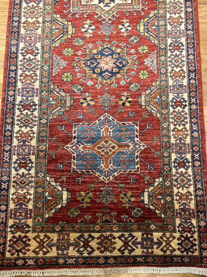 Pakistani Kazak Runner, 3'2" x 19'6", in blue, ivory, navy and red