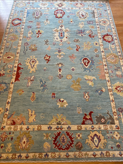 Afghan Oushak Rug, 6'1" x 8'10", in blue, navy, purple and red