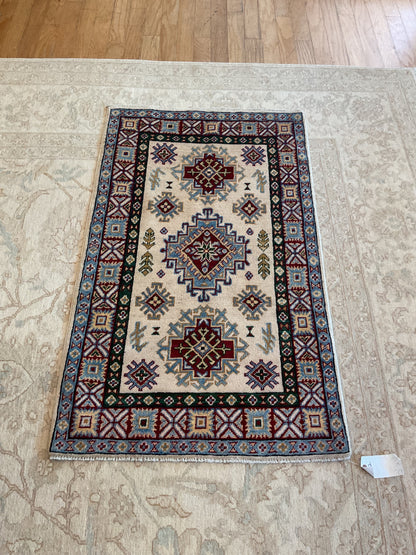 Pakistani Kazak Rug, 2'7" x 4'3", in blue, burgundy, hunter green and ivory - photo 2