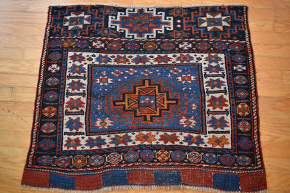 Antique Persian Kurdish Bagface, 2'6" x 3'9", in blue, brown, orange and red