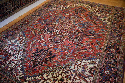 Antique Persian Heriz Rug, 8'1" x 11'2", in brick, ivory, navy and red