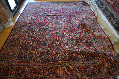 Antique Persian Sarouk Rug, 10'5" x 13'5", in burgundy, navy, teal and yellow