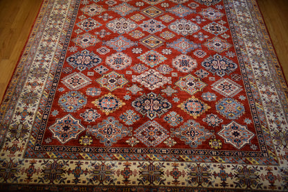 Pakistani Kazak Rug, 9'2" x 11'9", in blue, ivory and ruby