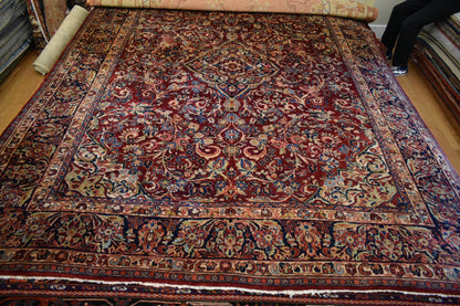 Antique Persian Sarouk Rug, 8'9" x 11'4", in burgundy, navy and red