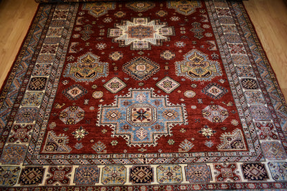 Pakistani Kazak Rug, 9'1" x 12'4", in blue, ivory and red
