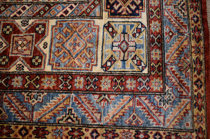Pakistani Kazak Rug, 9'1" x 12'4", in blue, ivory and red - photo 2