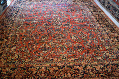 Antique Persian Sarouk Rug, 12'1" x 16'8", in burgundy, gold, navy and red