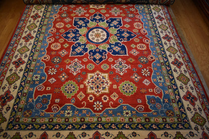 Afghan Kazak Rug, 8'8" x 12'1", in blue, cream, green and red