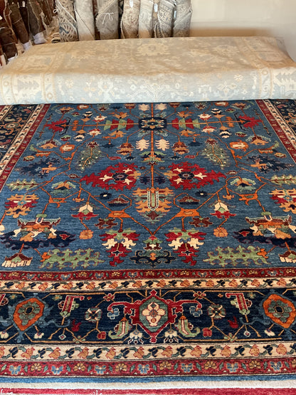 Afghan Serapi Rug, 10'1" x 13'10", in blue, navy, orange and red