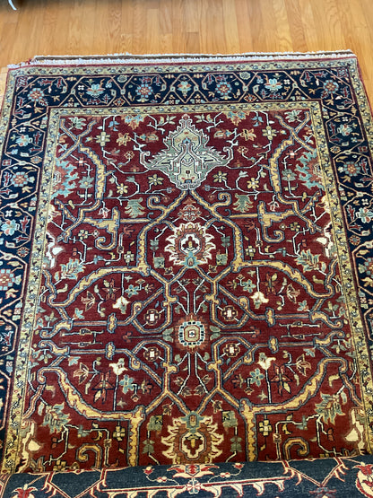 Indian Heriz Rug, 6' x 9'1", in burgundy, gold and navy