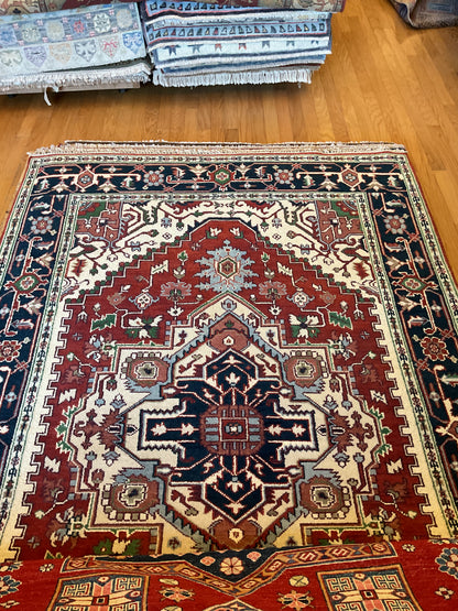Indian Heriz Rug, 6' x 9'1", in ivory, navy and red
