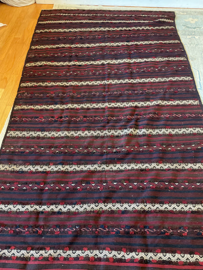 Afghan Kilim, 10'8" x 5'5", in burgundy, ivory, navy and red